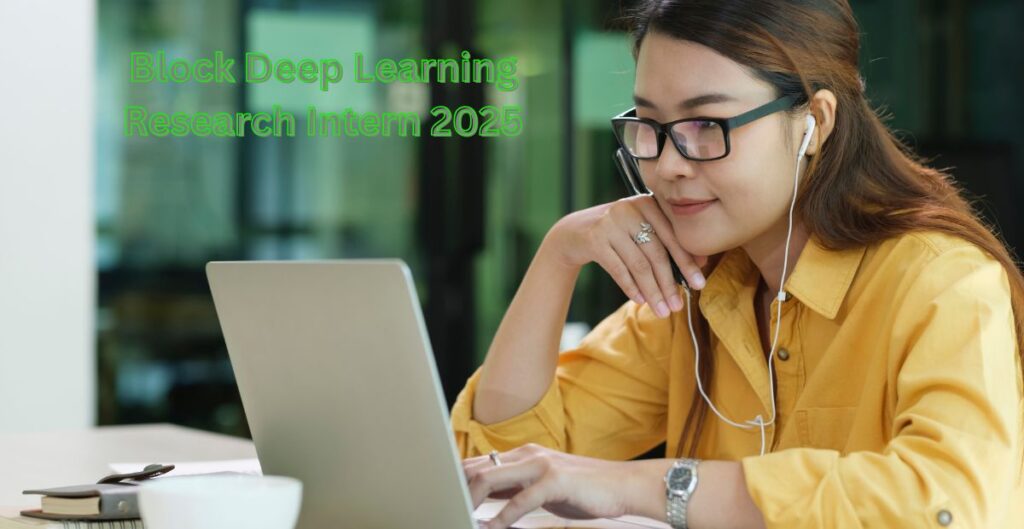 Intern coding an AI project using Python and deep learning tools at Block in a modern workspace