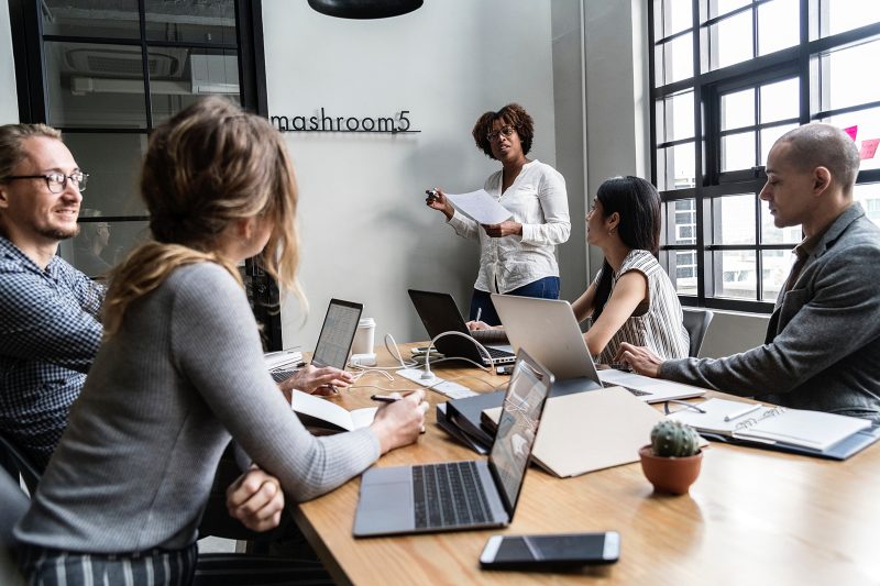 rawpixel-799380-unsplash.jpg Team of developers and designers working on innovative tech solutions at DisgnTech